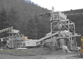 Johnson Ranger 600 yards per hour batch plant. Come with 2 10 yard mixers, storage silos, weighing hopper, conveyors, etc.