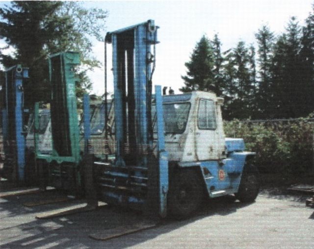 Used Cat V180 Forklift. 18,000 lb Capacity. 18 ft. Mast Height. Automatic, Gas, Fork Positioner, & Enclosed Cab.