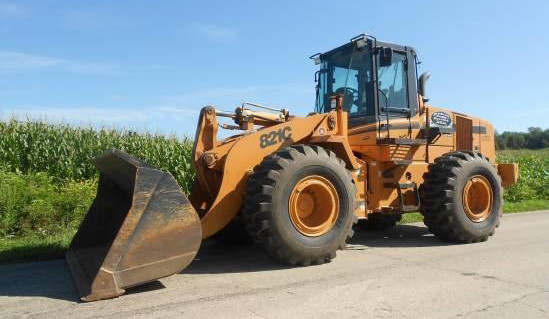 2004 Case Loader. "Excellent Condition!" Model: 821C. C/W 6 yd. Cleaning Bucket; 4 yd. GP Digging Bucket; 4 ft. Forks; 7.5 Forks & 10 ft. Dozer Blade.