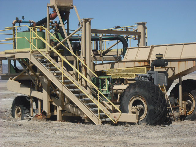 Gold Mining Placer Plant, Semi-mobile and mounted on earth moving tires.
