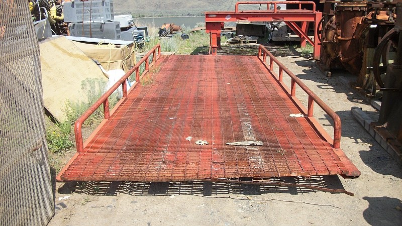30,000 lb. Capacity Long Loading Ramp. 8 ft. Wide x 30 Ft. Long. 20 ft. Sloping Ramp Section. Landing Gear at one end for Additional Height Adjustment.