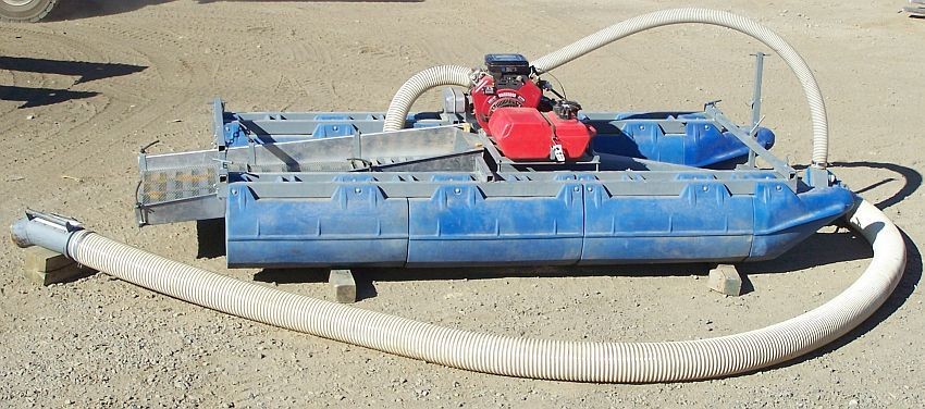 Dahlke Dredge Mfg. 7 inch floating dredge. Comes with 20hp gas drive pump and gast oil free air supply compressor.