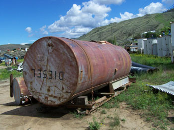 5000 GALLON TANK. 7 FT DIA. X 21 FT LONG. SKID MOUNTED