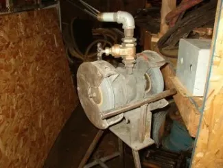 Used Air Tools. Air Operated Double Arbor Rock Bit Sharpener.