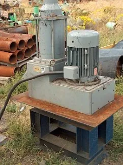 15 HP Szego Vertical Cage Mill.