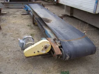 Used Square Tubing Conveyor. 24 in. x 15 ft. Long. 5 HP Motor through Radicon Reducer.