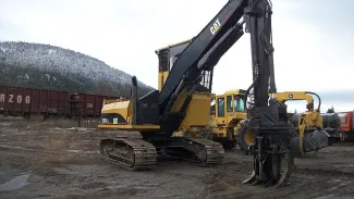 Used Cat Excavator - Log Loader. Model: 320C. New Rails.