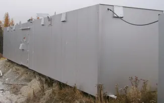 50 ft. L x 10 ft. W x 8 ft. H Powder Mag. C/W Surveillance System. Mounted on Steel Skid.