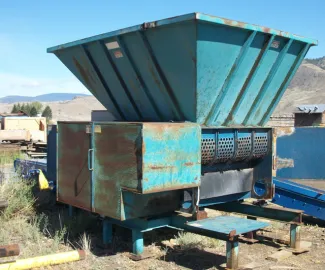 Challenger 400 Pallet Grinder. Driven by 50 HP - 440 Volt Electric Motor. C/W Shaft Mount Reducer and Electrical Control Panel.