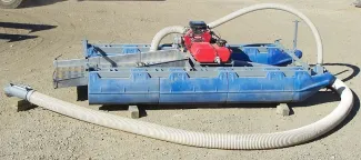 Dahlke Dredge Mfg. 7 inch floating dredge. Comes with 20hp gas drive pump and gast oil free air supply compressor.