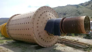 Used Dominion Rod Mill. 9.5 ft. x 14 ft. Long. 500 HP Motor.